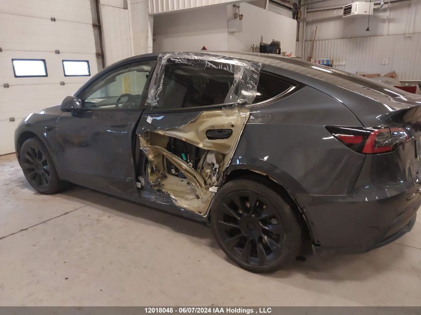2022 Tesla Model Y VIN: 7SAYGDEEXNF562560 Lot: 12018048