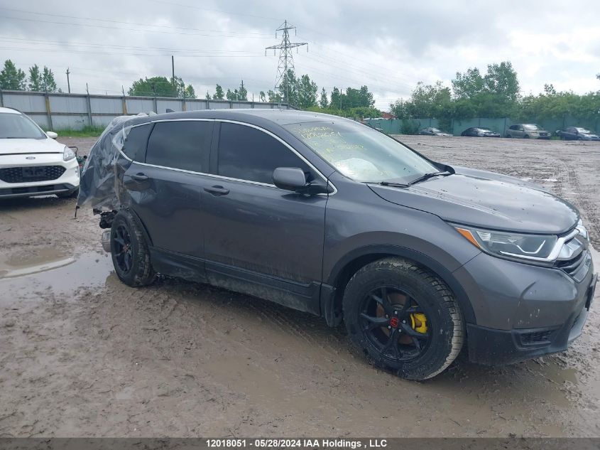 2018 Honda Cr-V VIN: 2HKRW1H37JH002083 Lot: 12018051