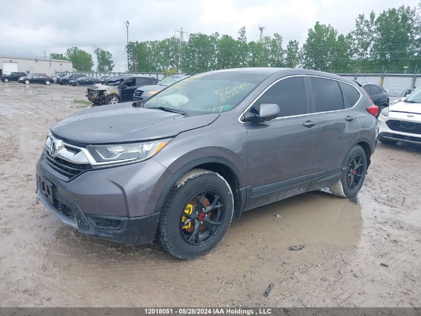 2018 Honda Cr-V VIN: 2HKRW1H37JH002083 Lot: 12018051