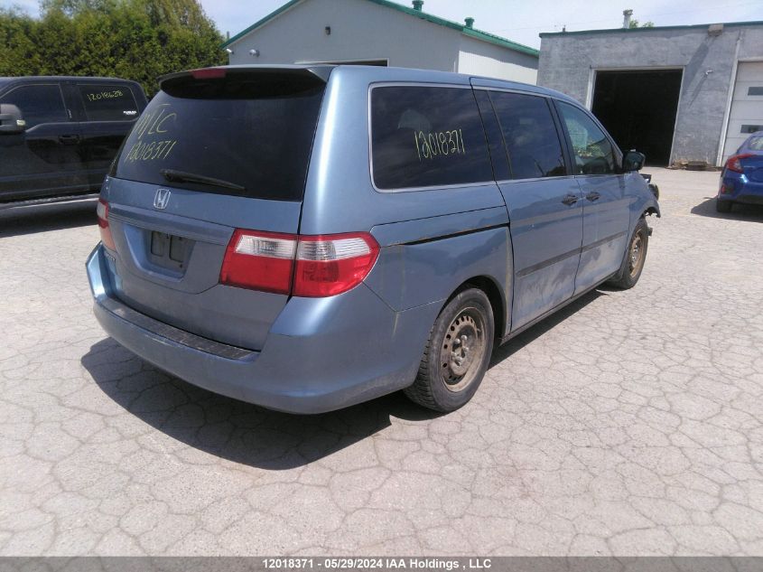 2007 Honda Odyssey VIN: 5FNRL38277B513828 Lot: 12018371