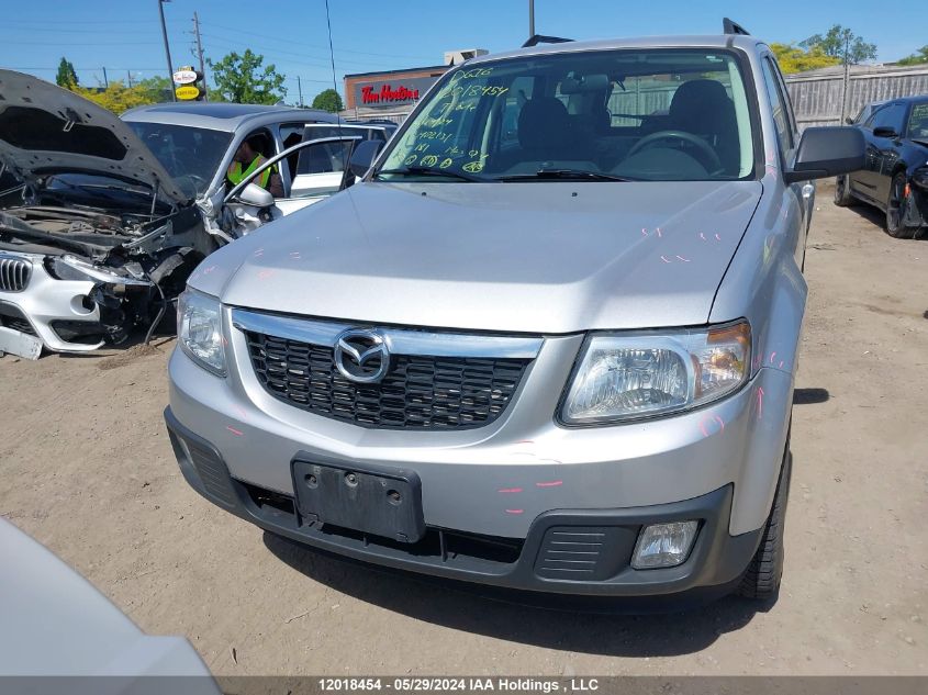 2011 Mazda Tribute I VIN: 4F2CY0C7XBKM02131 Lot: 12018454