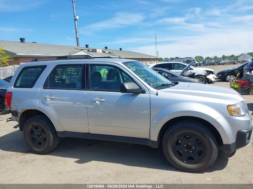 2011 Mazda Tribute I VIN: 4F2CY0C7XBKM02131 Lot: 12018454