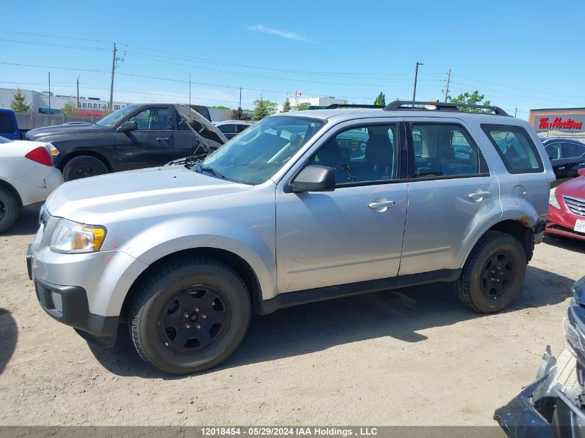 2011 Mazda Tribute I VIN: 4F2CY0C7XBKM02131 Lot: 12018454