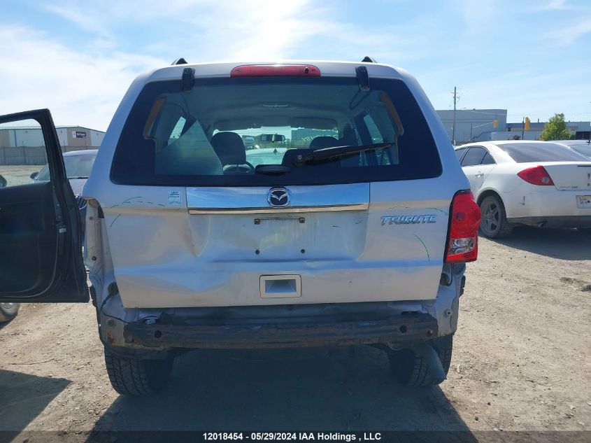 2011 Mazda Tribute I VIN: 4F2CY0C7XBKM02131 Lot: 12018454