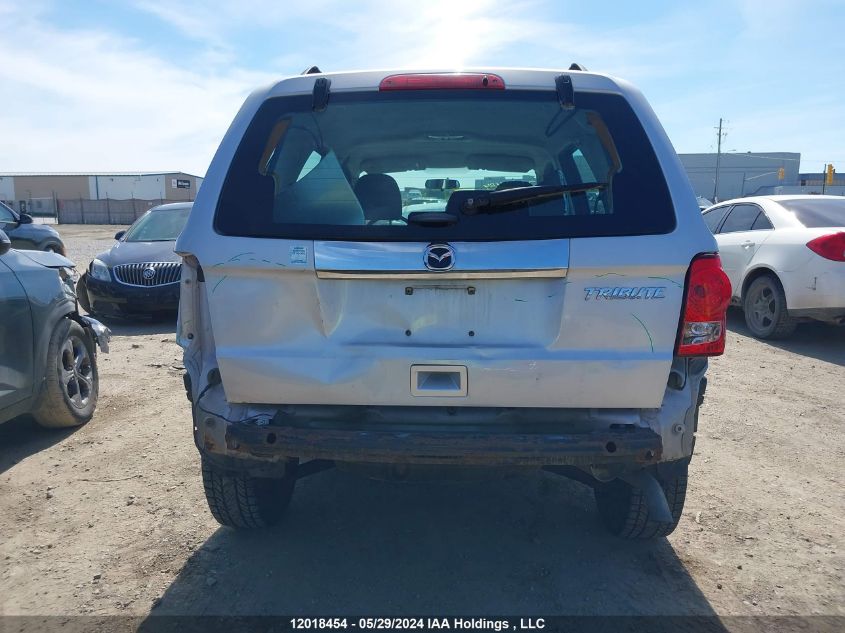 2011 Mazda Tribute I VIN: 4F2CY0C7XBKM02131 Lot: 12018454