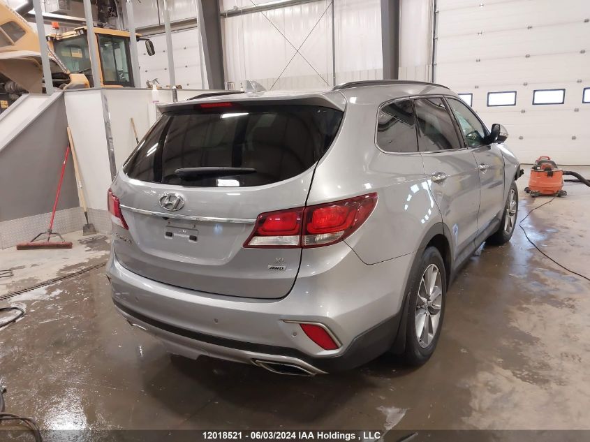 2018 Hyundai Santa Fe Se/Limited VIN: KM8SNDHF0JU265176 Lot: 12018521