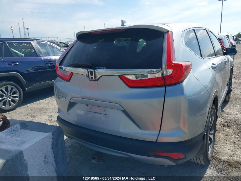 2018 Honda Cr-V VIN: 2HKRW1H39JH001016 Lot: 12018565