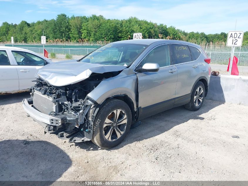 2018 Honda Cr-V VIN: 2HKRW1H39JH001016 Lot: 12018565