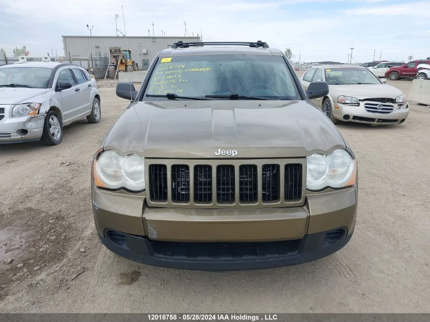 2009 Jeep Grand Cherokee Laredo VIN: 1J8GR48K39C518013 Lot: 12018758