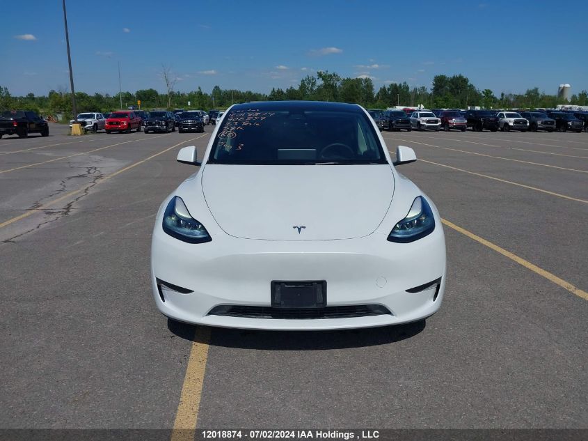 2023 Tesla Model Y VIN: LRWYGDFD7PC902859 Lot: 12018874