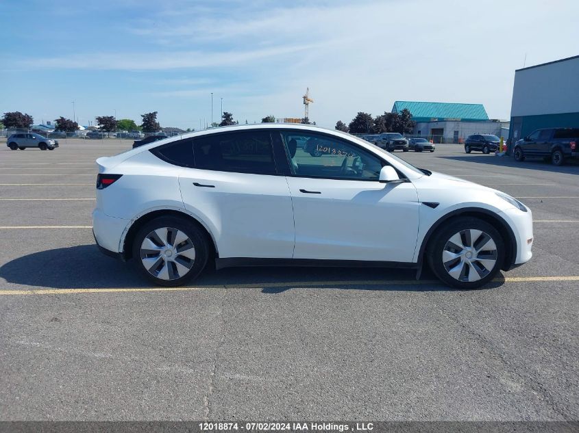 2023 Tesla Model Y VIN: LRWYGDFD7PC902859 Lot: 12018874