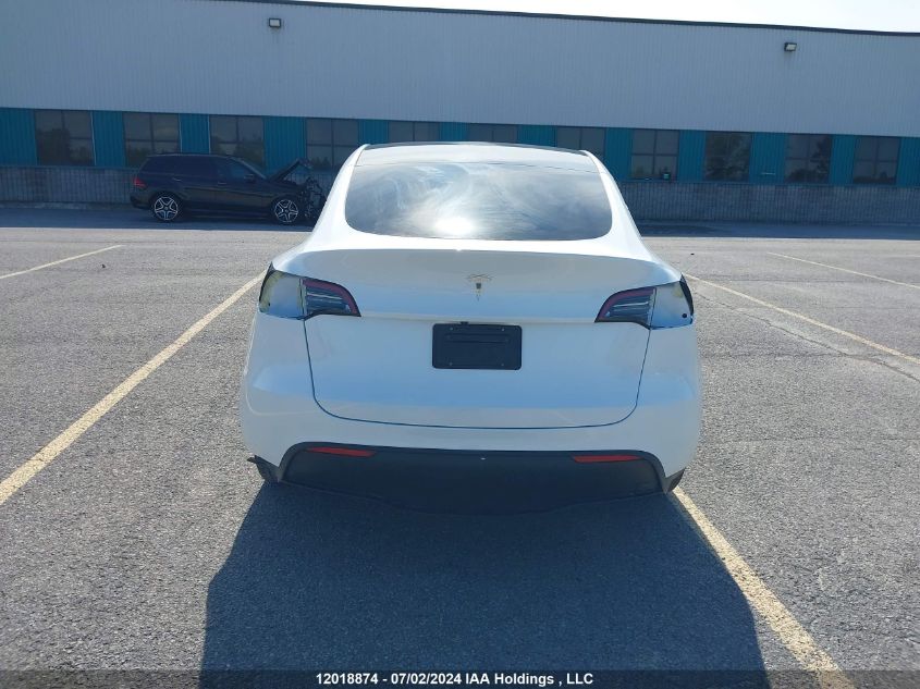 2023 Tesla Model Y VIN: LRWYGDFD7PC902859 Lot: 12018874