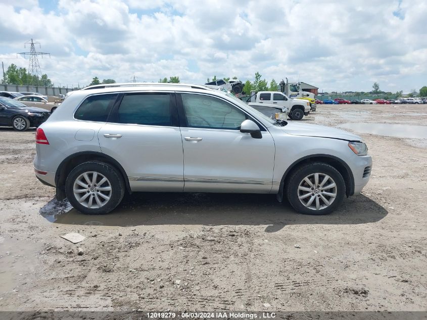 2014 Volkswagen Touareg VIN: WVGEP9BP7ED007166 Lot: 12019279