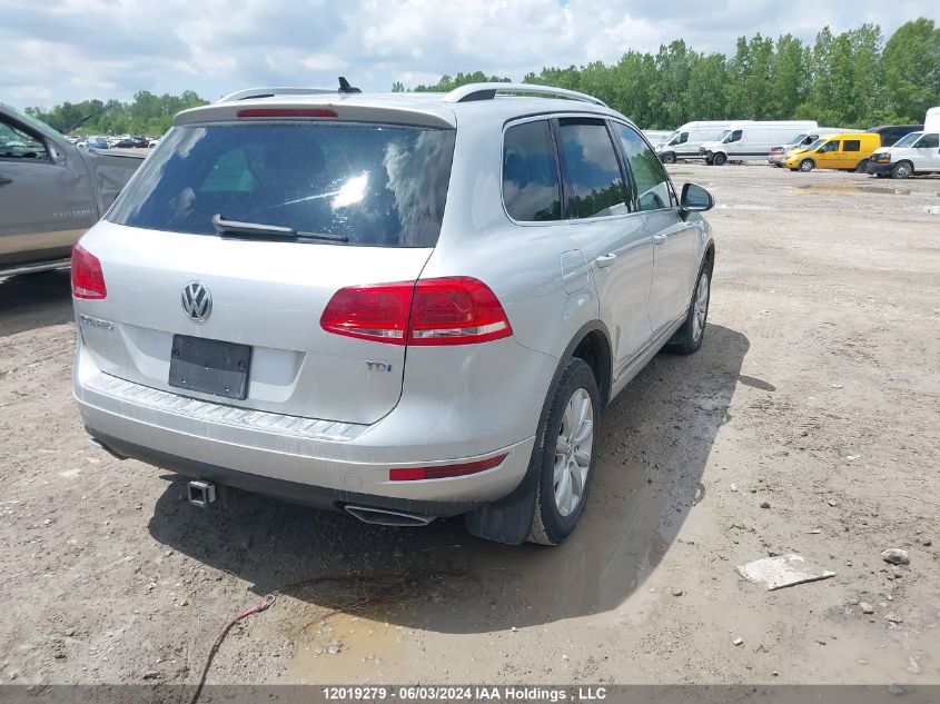 2014 Volkswagen Touareg VIN: WVGEP9BP7ED007166 Lot: 12019279