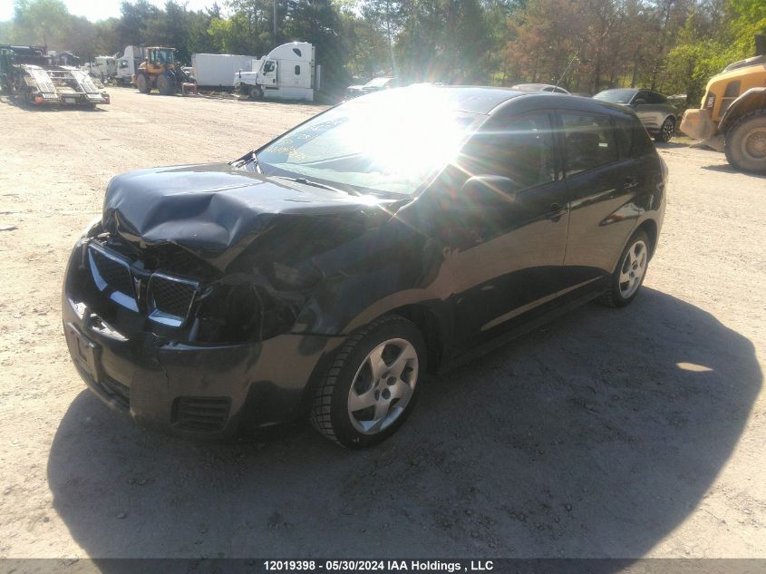 2010 Pontiac Vibe VIN: 5Y2SP6E83AZ411587 Lot: 12019398