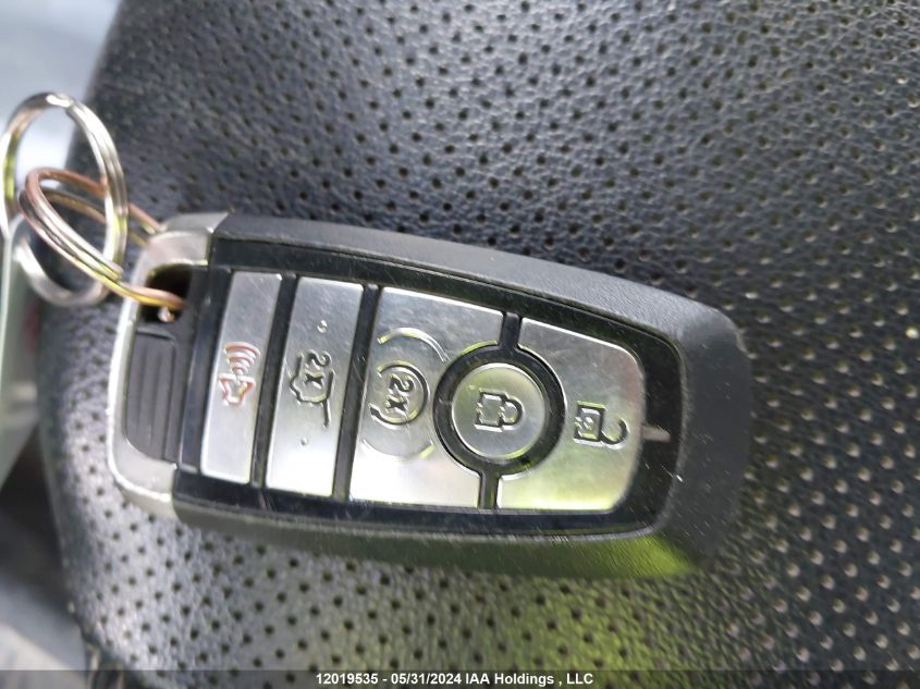 2021 Ford Escape Titanium VIN: 1FMCU9J98MUA77745 Lot: 12019535