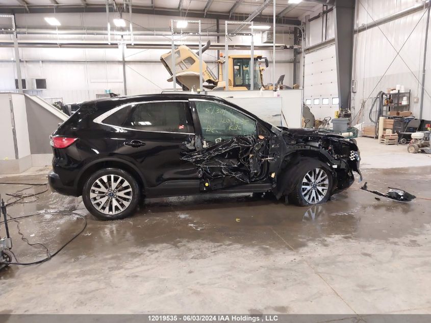 2021 Ford Escape Titanium VIN: 1FMCU9J98MUA77745 Lot: 12019535