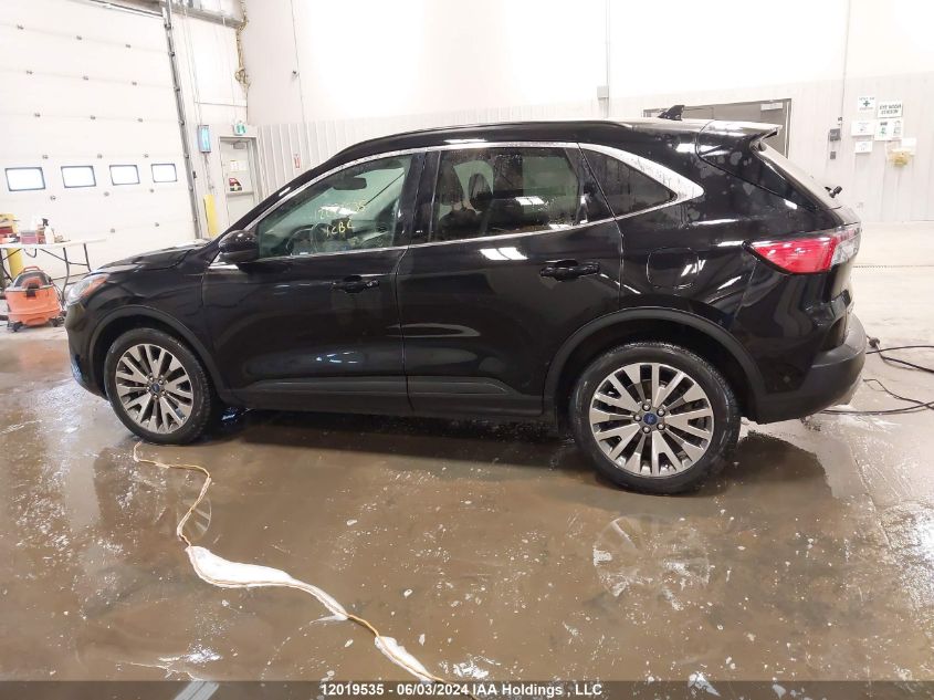 2021 Ford Escape Titanium VIN: 1FMCU9J98MUA77745 Lot: 12019535