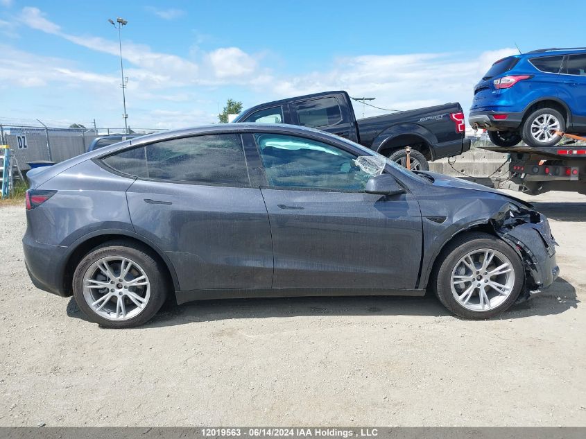 2023 Tesla Model Y VIN: LRWYGDEEXPC010129 Lot: 12019563