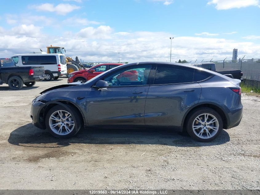 2023 Tesla Model Y VIN: LRWYGDEEXPC010129 Lot: 12019563