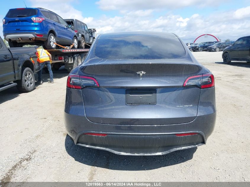 2023 Tesla Model Y VIN: LRWYGDEEXPC010129 Lot: 12019563