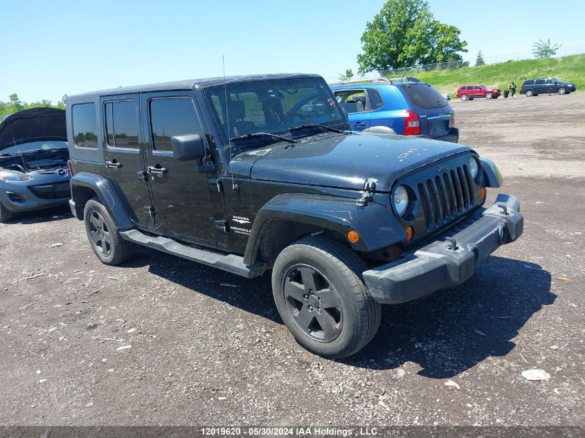 2007 Jeep Wrangler Unlimited Sahara VIN: 1J8GA59147L206251 Lot: 12019620