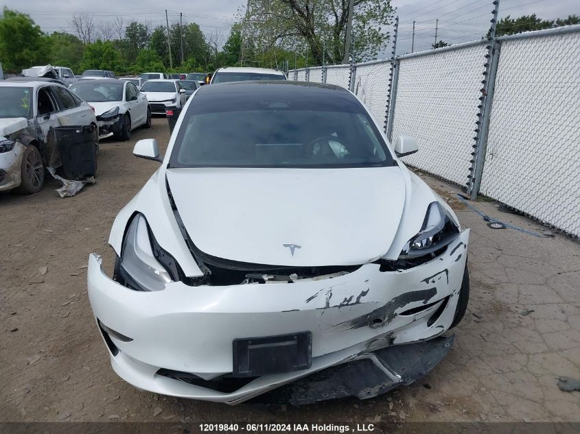 2022 Tesla Model 3 VIN: 5YJ3E1EA6NF309714 Lot: 12019840