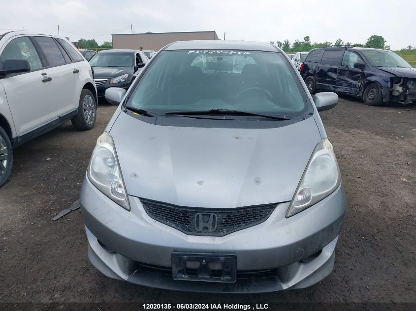 2009 Honda Fit VIN: JHMGE87829S802818 Lot: 12020135