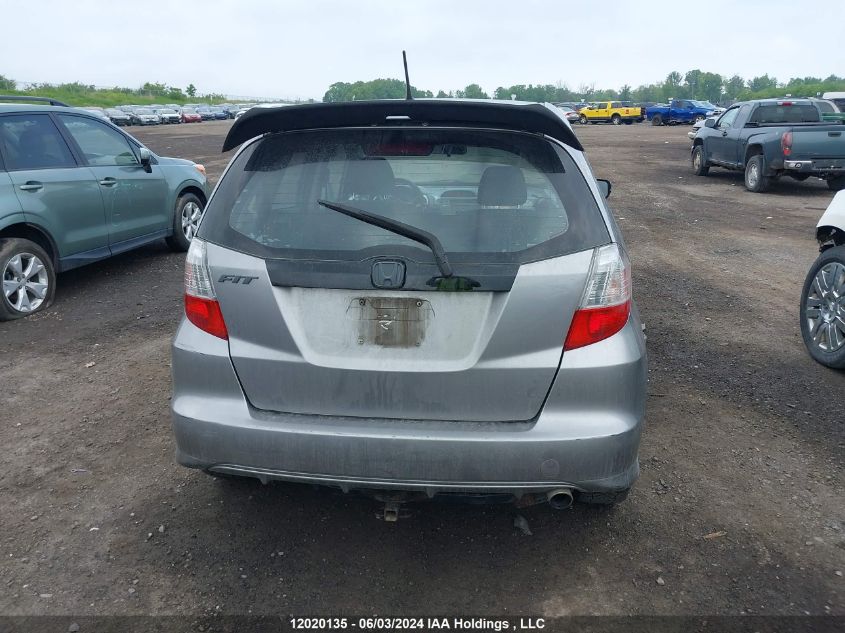 2009 Honda Fit VIN: JHMGE87829S802818 Lot: 12020135