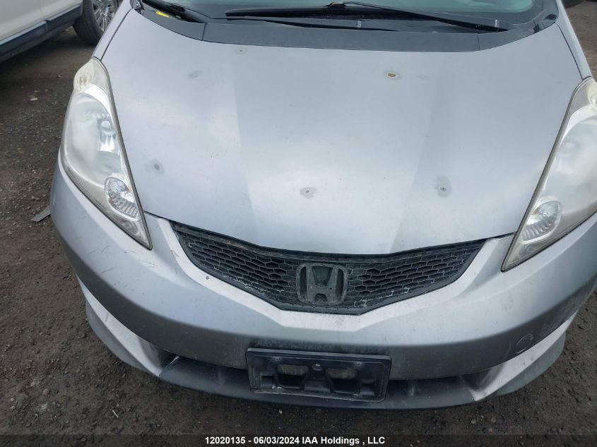 2009 Honda Fit VIN: JHMGE87829S802818 Lot: 12020135