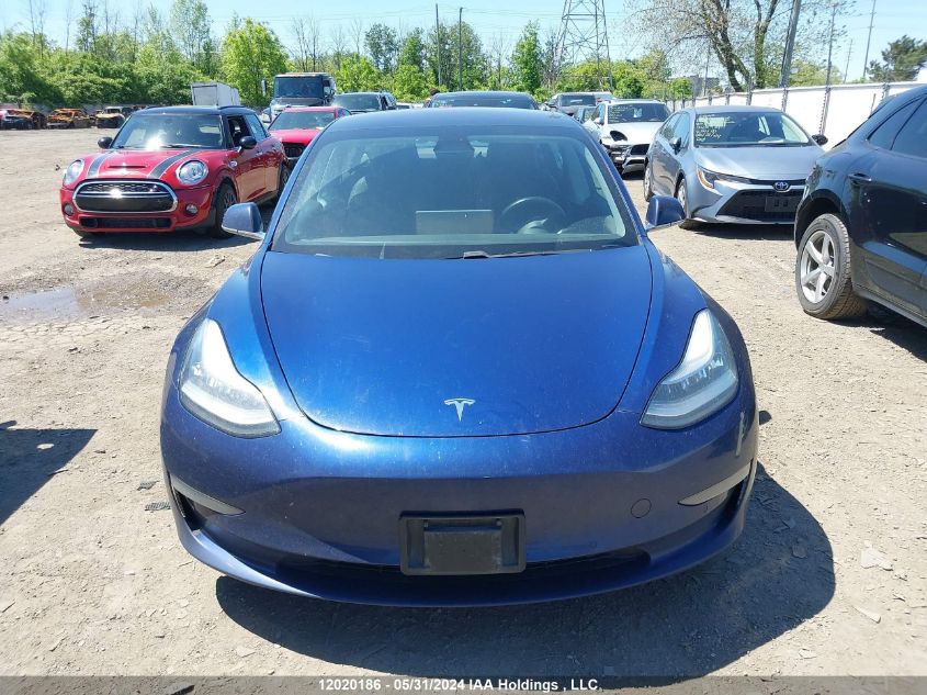 2018 Tesla Model 3 VIN: 5YJ3E1EB1JF127082 Lot: 12020186