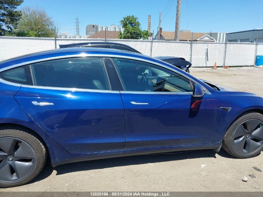 2018 Tesla Model 3 VIN: 5YJ3E1EB1JF127082 Lot: 12020186