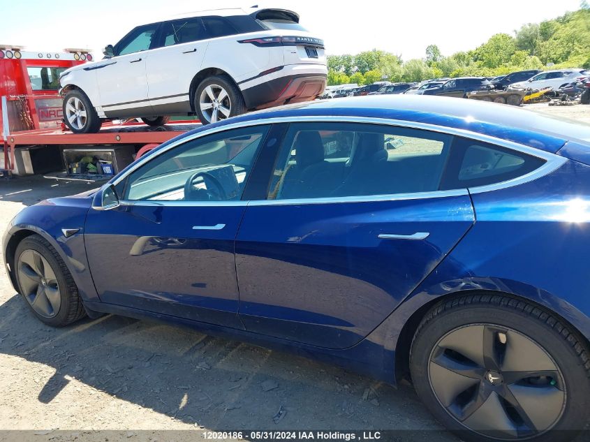 2018 Tesla Model 3 VIN: 5YJ3E1EB1JF127082 Lot: 12020186
