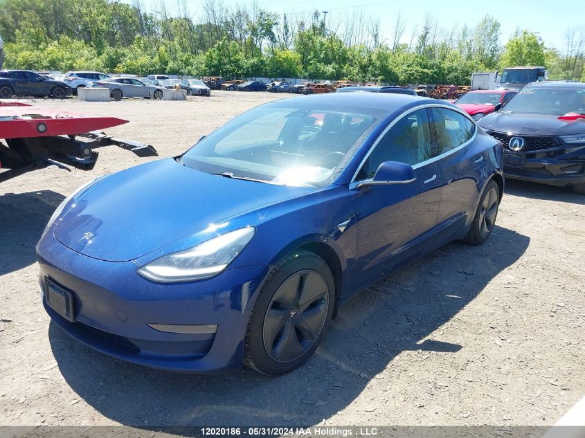 2018 Tesla Model 3 VIN: 5YJ3E1EB1JF127082 Lot: 12020186