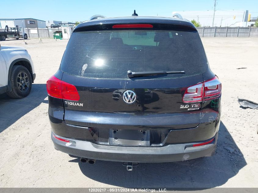 2014 Volkswagen Tiguan VIN: WVGJV3AX7EW569866 Lot: 12020217