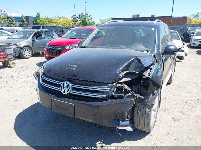 2014 Volkswagen Tiguan VIN: WVGJV3AX7EW569866 Lot: 12020217