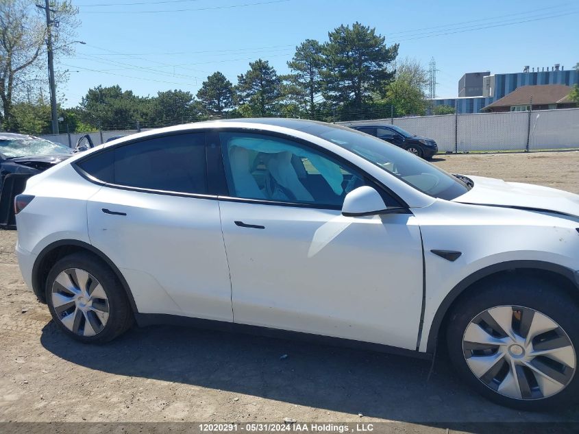 2023 Tesla Model Y VIN: LRWYGDFD6PC966987 Lot: 12020291