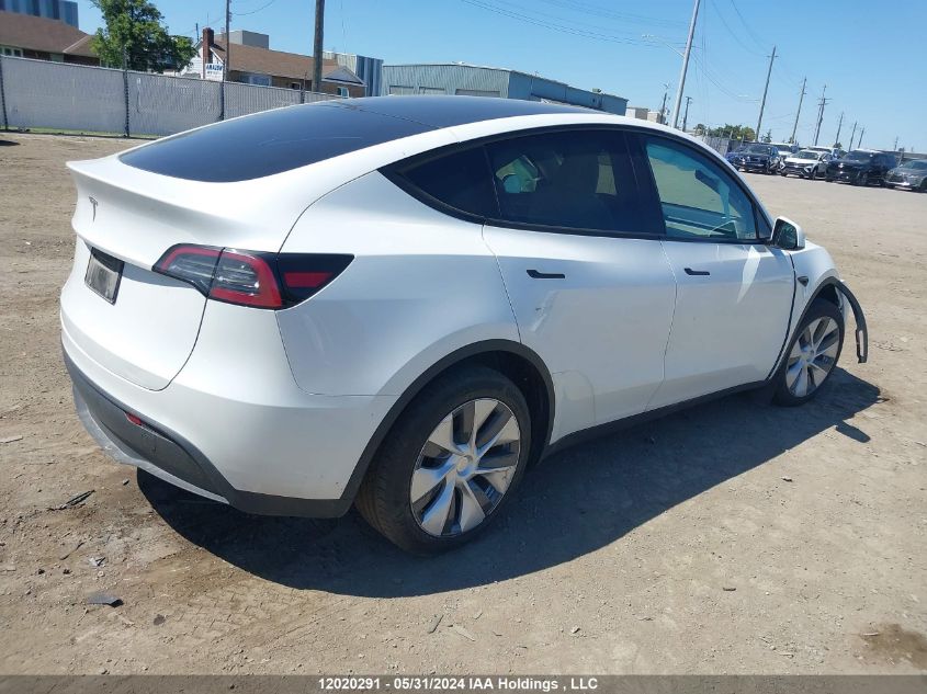 2023 Tesla Model Y VIN: LRWYGDFD6PC966987 Lot: 12020291