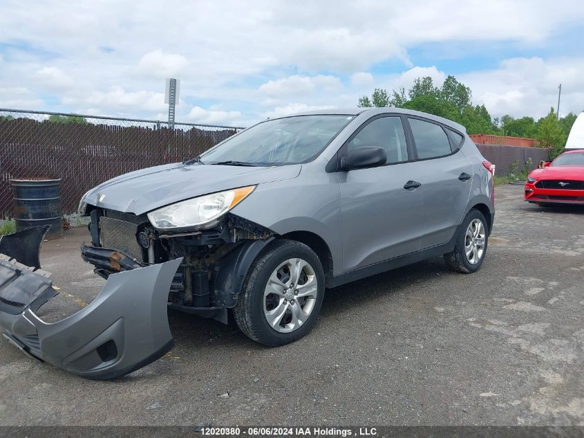 2011 Hyundai Tucson VIN: KM8JT3AC2BU165657 Lot: 12020380