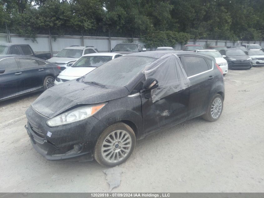 2014 Ford Fiesta Titanium VIN: 3FADP4FJ2EM193539 Lot: 12020518