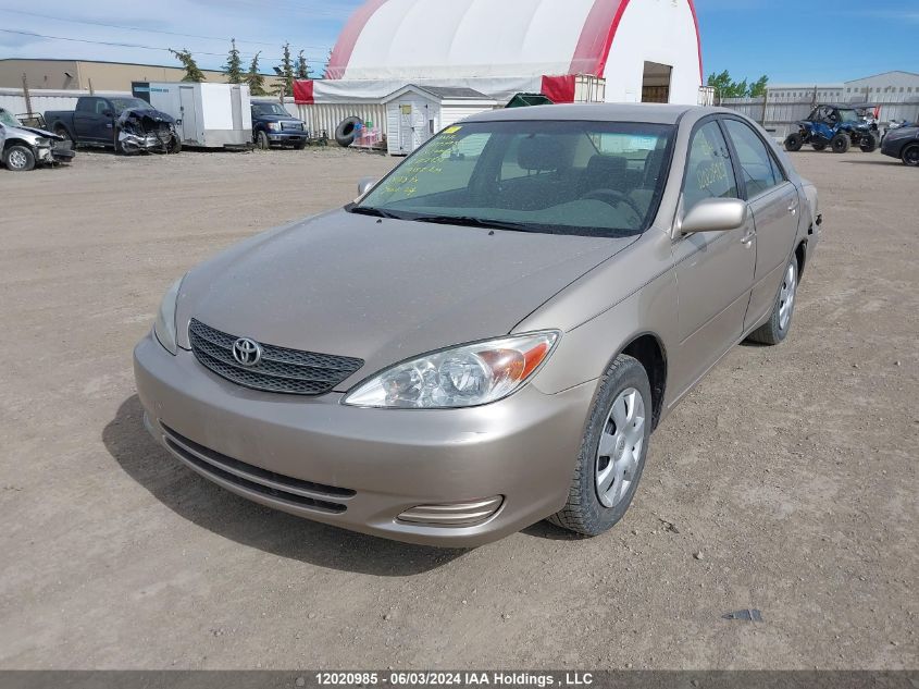 2003 Toyota Camry Le/Xle VIN: JTDBE32KX30202438 Lot: 12020985