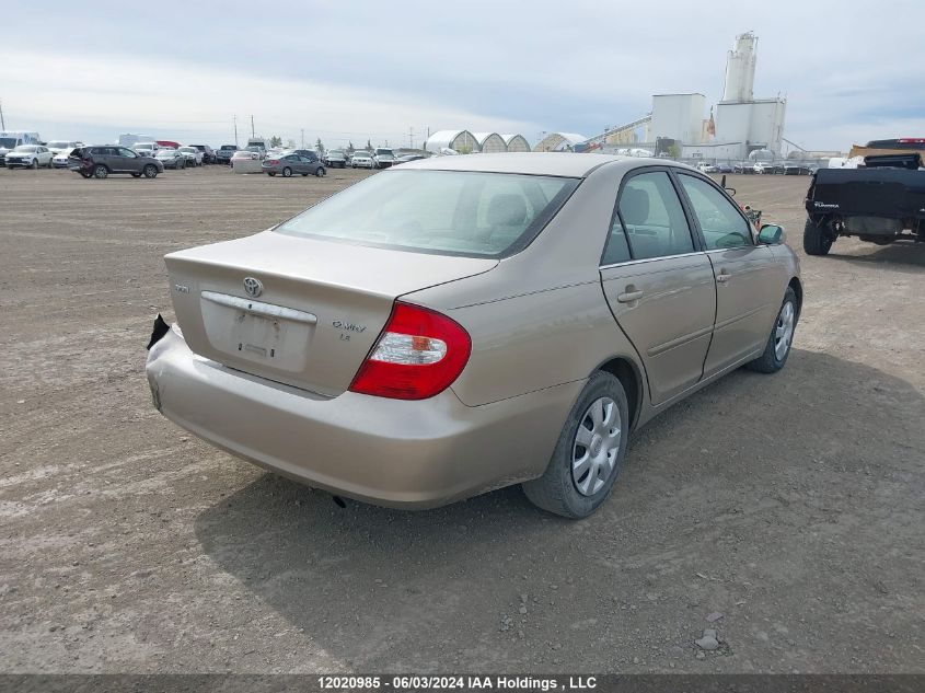 2003 Toyota Camry Le/Xle VIN: JTDBE32KX30202438 Lot: 12020985