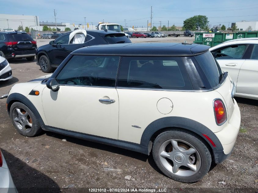 2009 Mini Cooper Hardtop VIN: WMWMF33549TW78977 Lot: 12021012