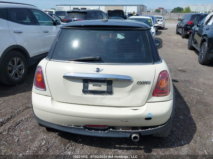 2009 Mini Cooper Hardtop VIN: WMWMF33549TW78977 Lot: 12021012