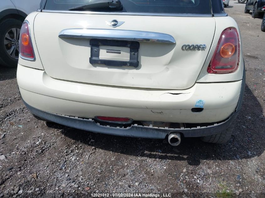 2009 Mini Cooper Hardtop VIN: WMWMF33549TW78977 Lot: 12021012