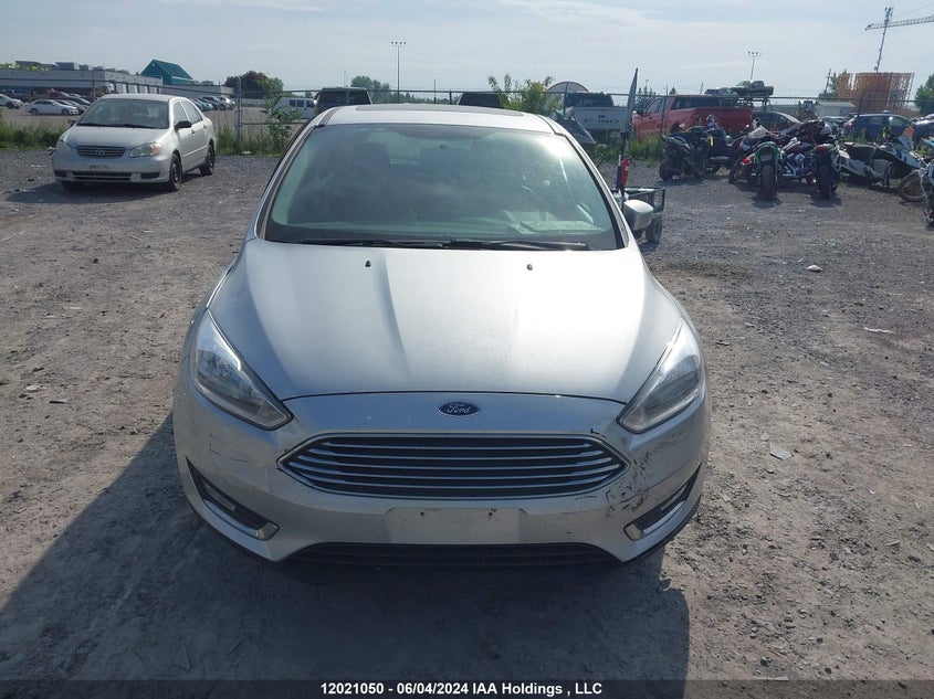 2018 Ford Focus Titanium VIN: 1FADP3N28JL262637 Lot: 12021050
