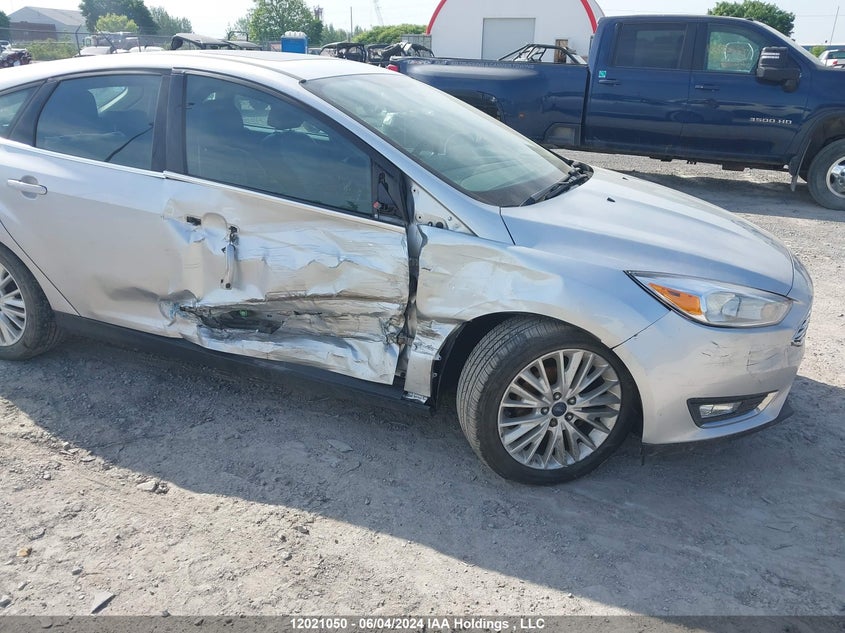 2018 Ford Focus Titanium VIN: 1FADP3N28JL262637 Lot: 12021050