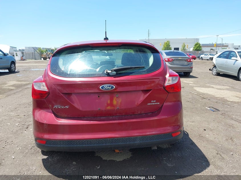 2014 Ford Focus Se VIN: 1FADP3K26EL314938 Lot: 12021091
