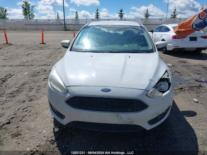 2015 Ford Focus Se VIN: 1FADP3F26FL271617 Lot: 12021231