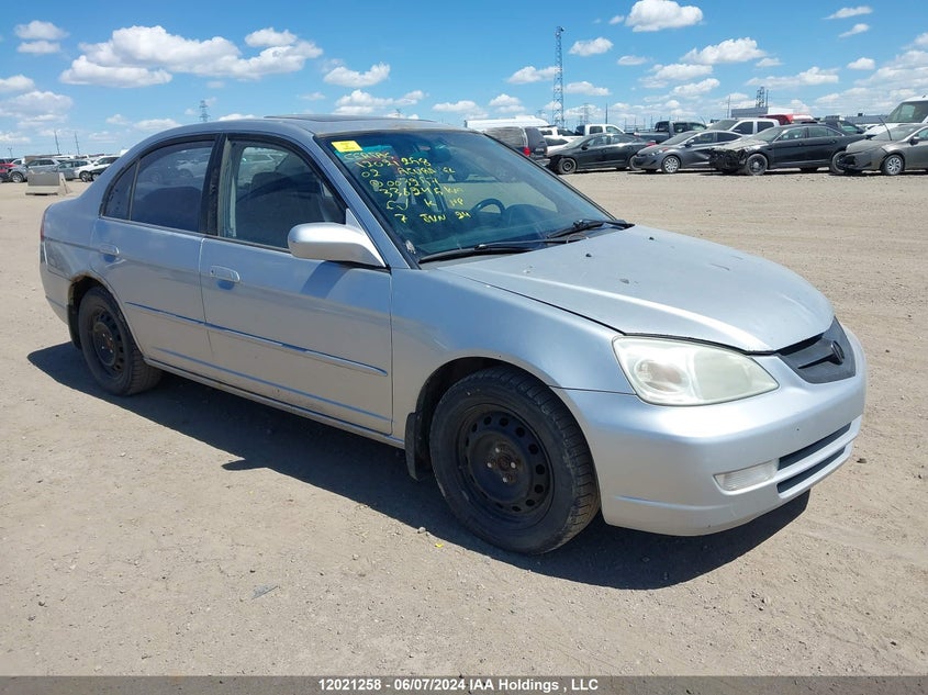 2002 Acura El VIN: 2HHES35812H003257 Lot: 12021258